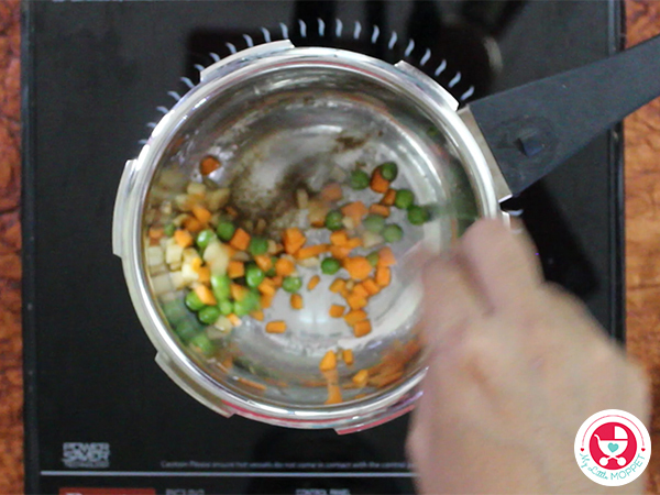 Add carrot, potato and green peas