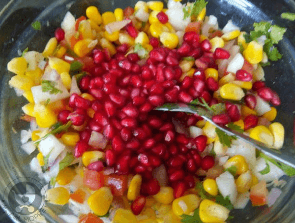  Add chopped onions, tomatoes , coriander leaves and pomegranate seeds 