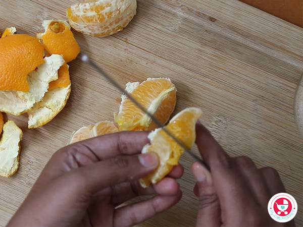 Peel and deseed the orange.