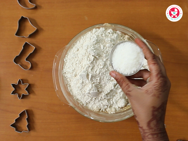 whole wheat flour, almond flour, desiccated coconut in a bowl and mix well.