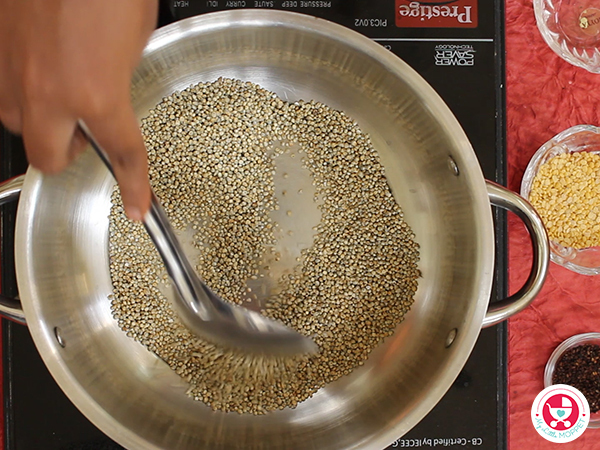 Roast the millet, moong dal and til seeds separately.