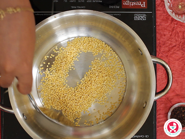 Roast the millet, moong dal and til seeds separately.