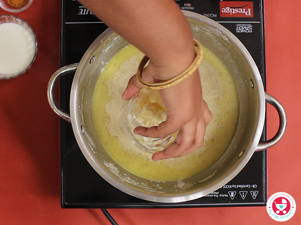 Add 1½ cups of water and salt to taste and bring it to boil.