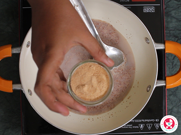  In a pan add blended mixture and dates powder.