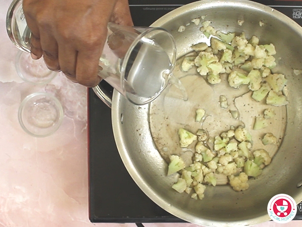 Add blanched cauliflower florets.